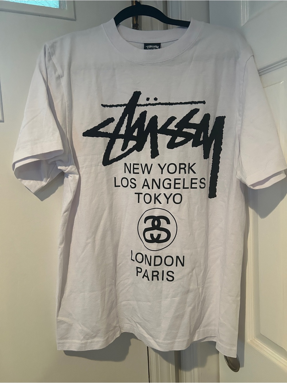 Stussy men’s White Logo Graphic Tee - City List Print